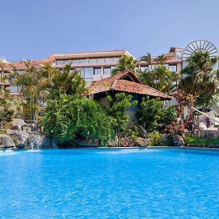 Wyndham San Jose Herradura Bagian luar foto The swimming pool at the Sheraton Kauai Resort