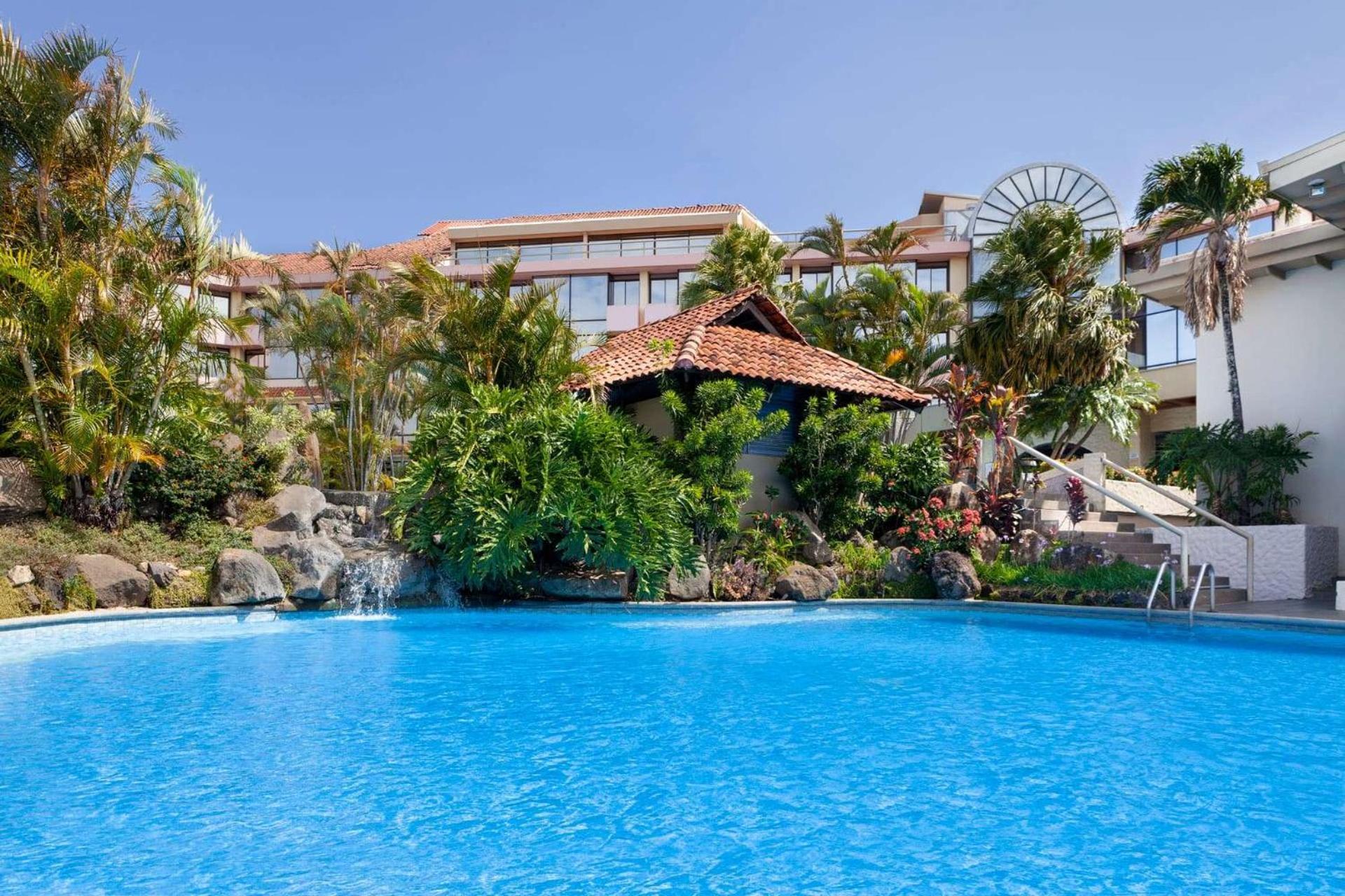 Wyndham San Jose Herradura Bagian luar foto The swimming pool at the Sheraton Kauai Resort