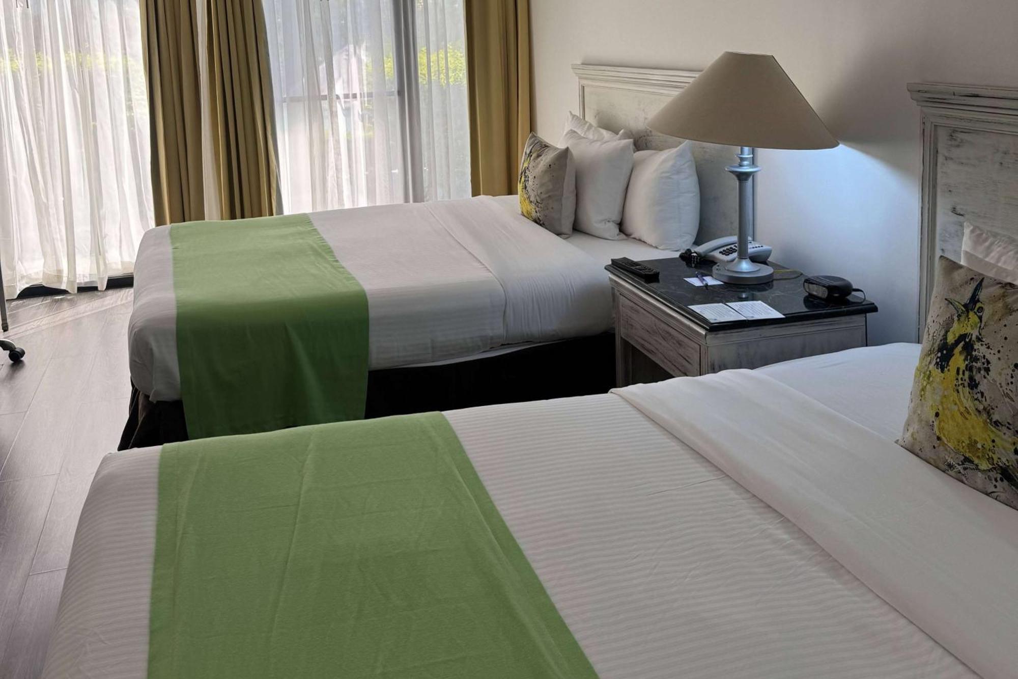 Wyndham San Jose Herradura Bagian luar foto A room at the hotel